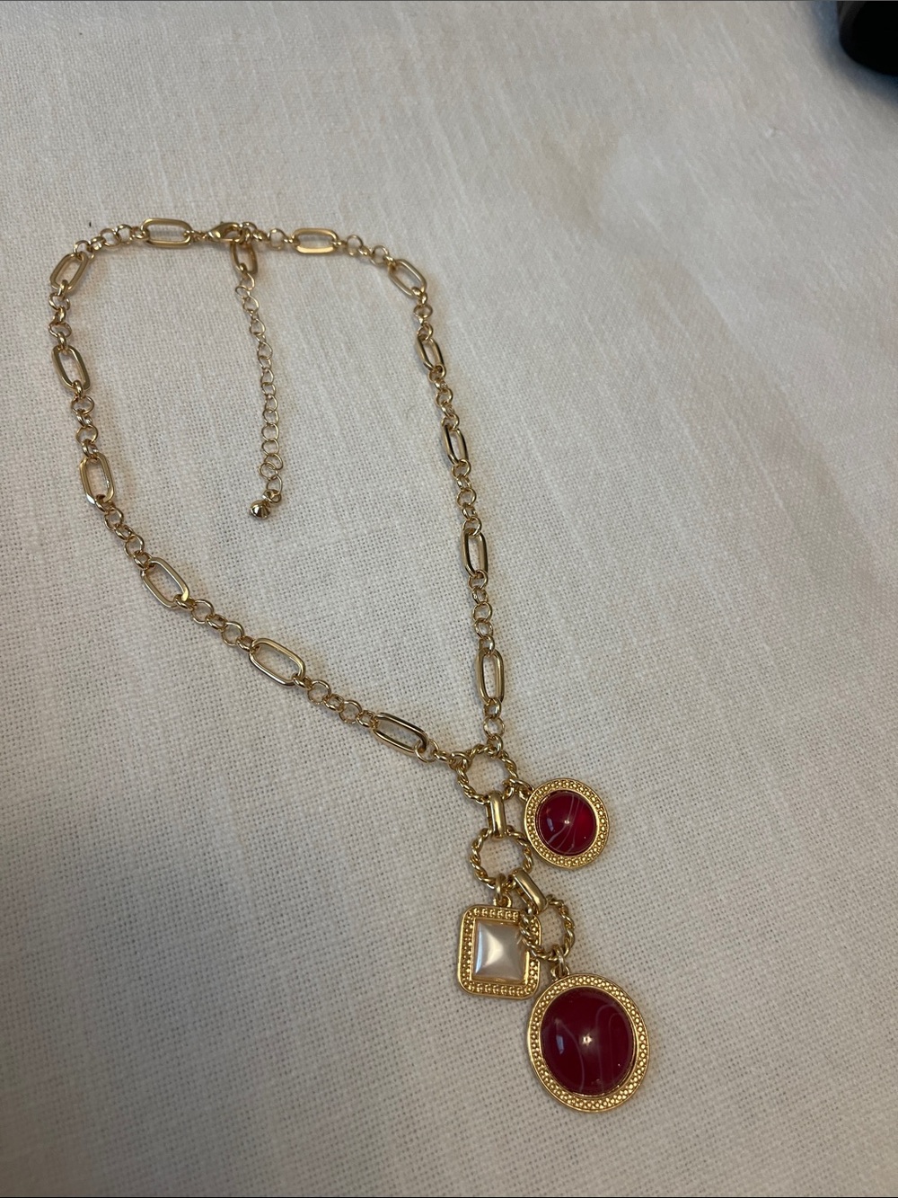 Gold and Garnet Charm Necklace